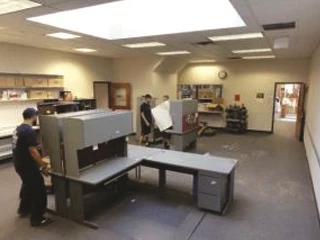 Pro Junk Dispatch team removing office furniture